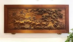 a wood carving on a wall
